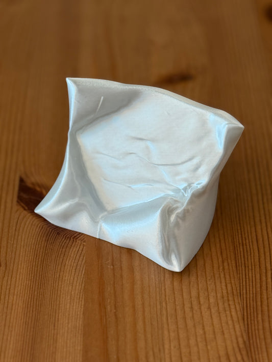 The Card Cradle displaying business cards in a clean modern workspace