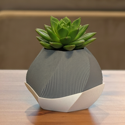 Close-up view highlighting the smooth details of the Sofia planter and saucer.