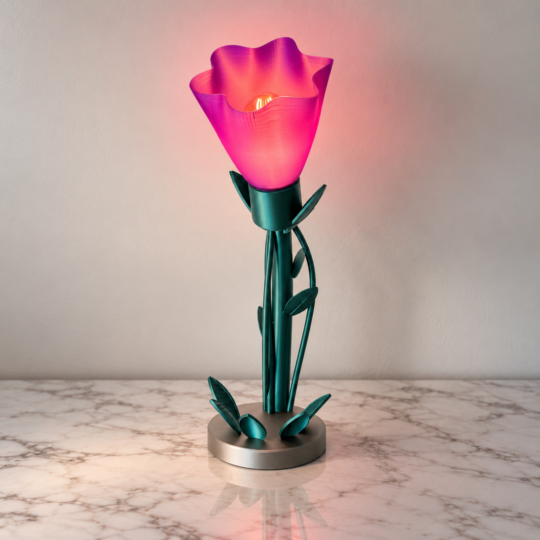 Lumiflora Table Lamp with a translucent flower shade and sculpted botanical leaves