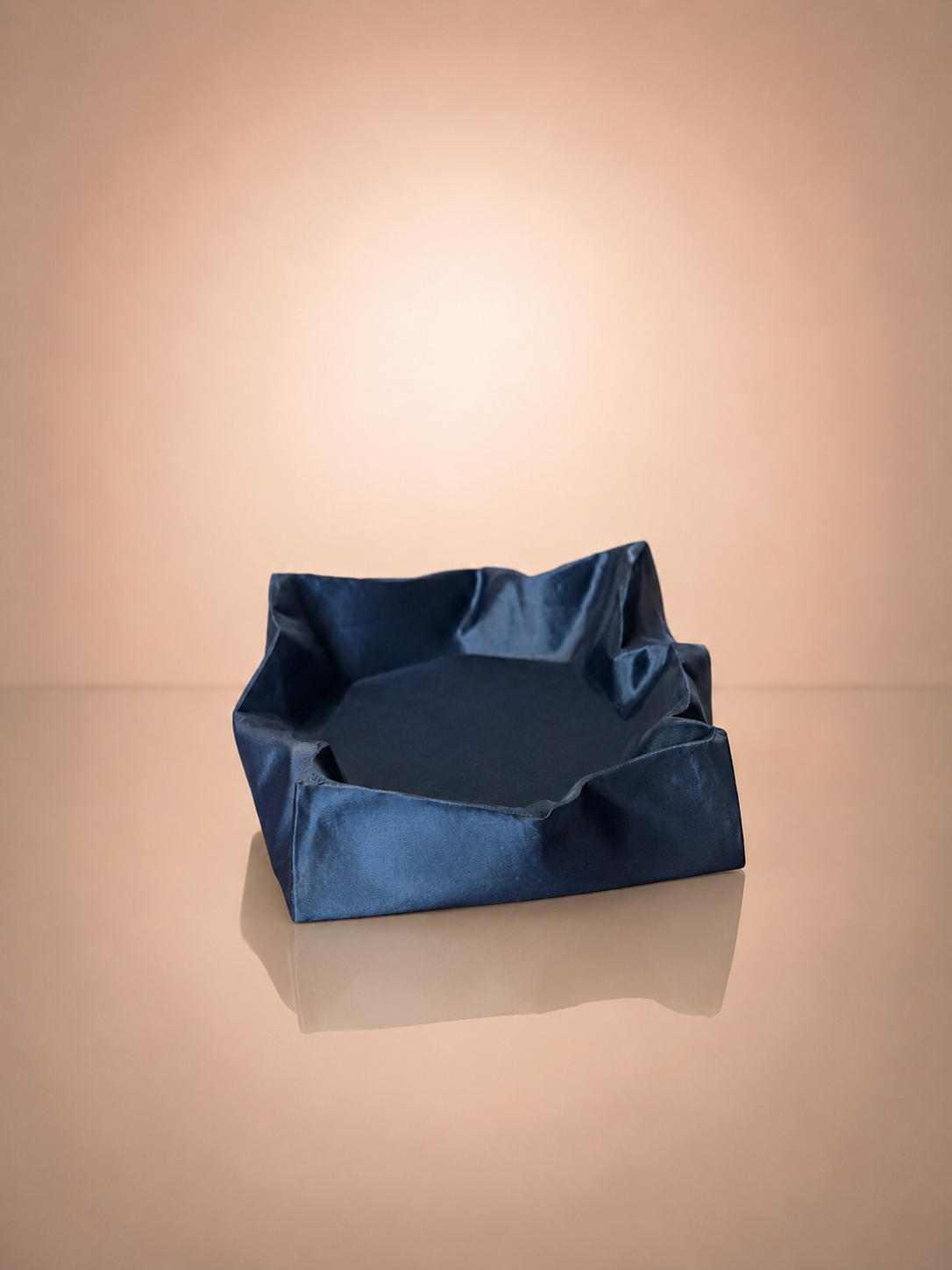 Modern Puffy Valet Organizer showcasing its soft padded inspired form and functional storage compartments.