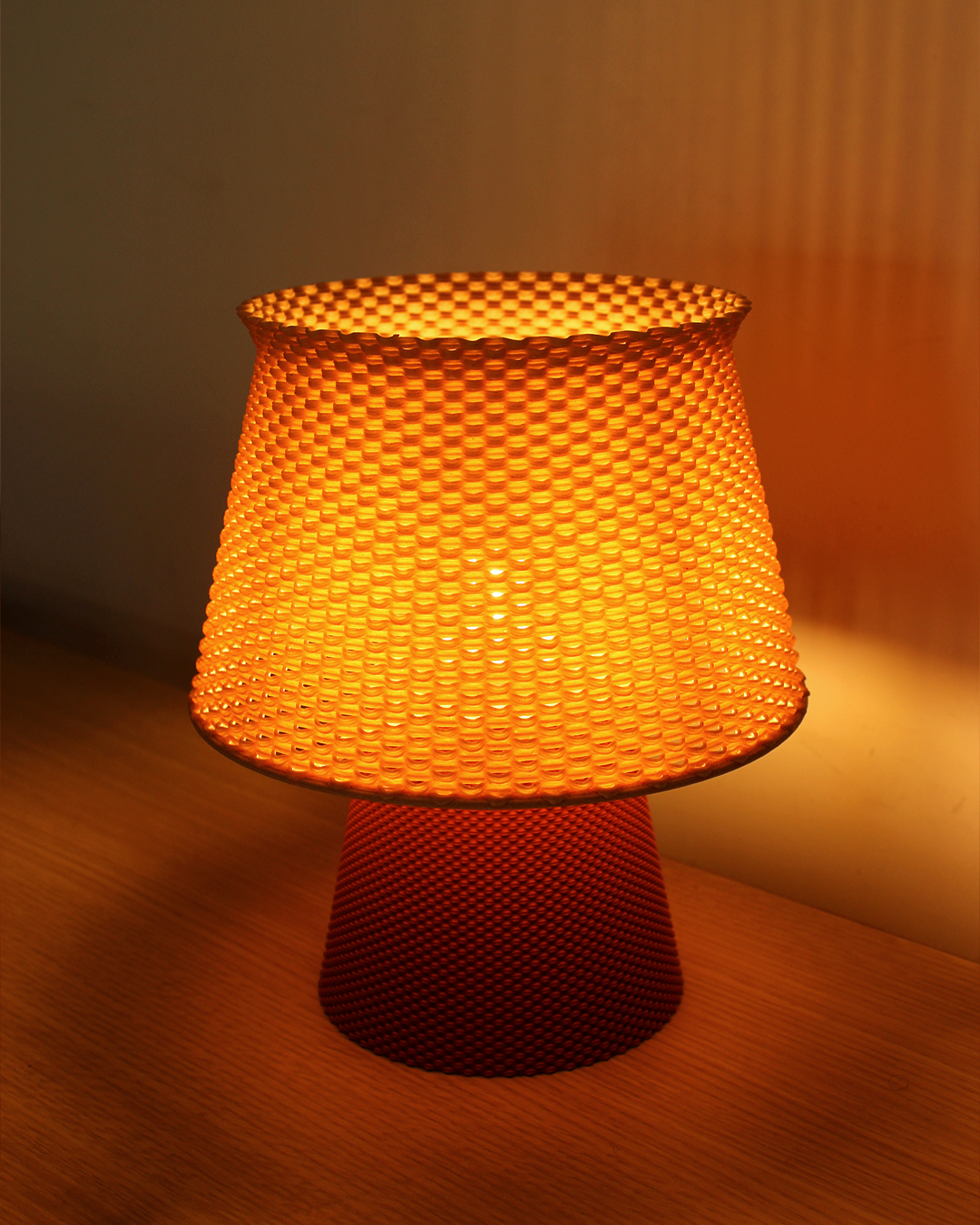 Contemporary Bruno Ripplemesh lamp used as ambient lighting in a modern interior.