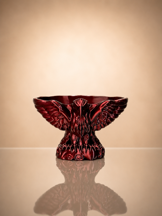 Eagle Bowl decorative centerpiece with detailed eagle sculpture and metallic finish.