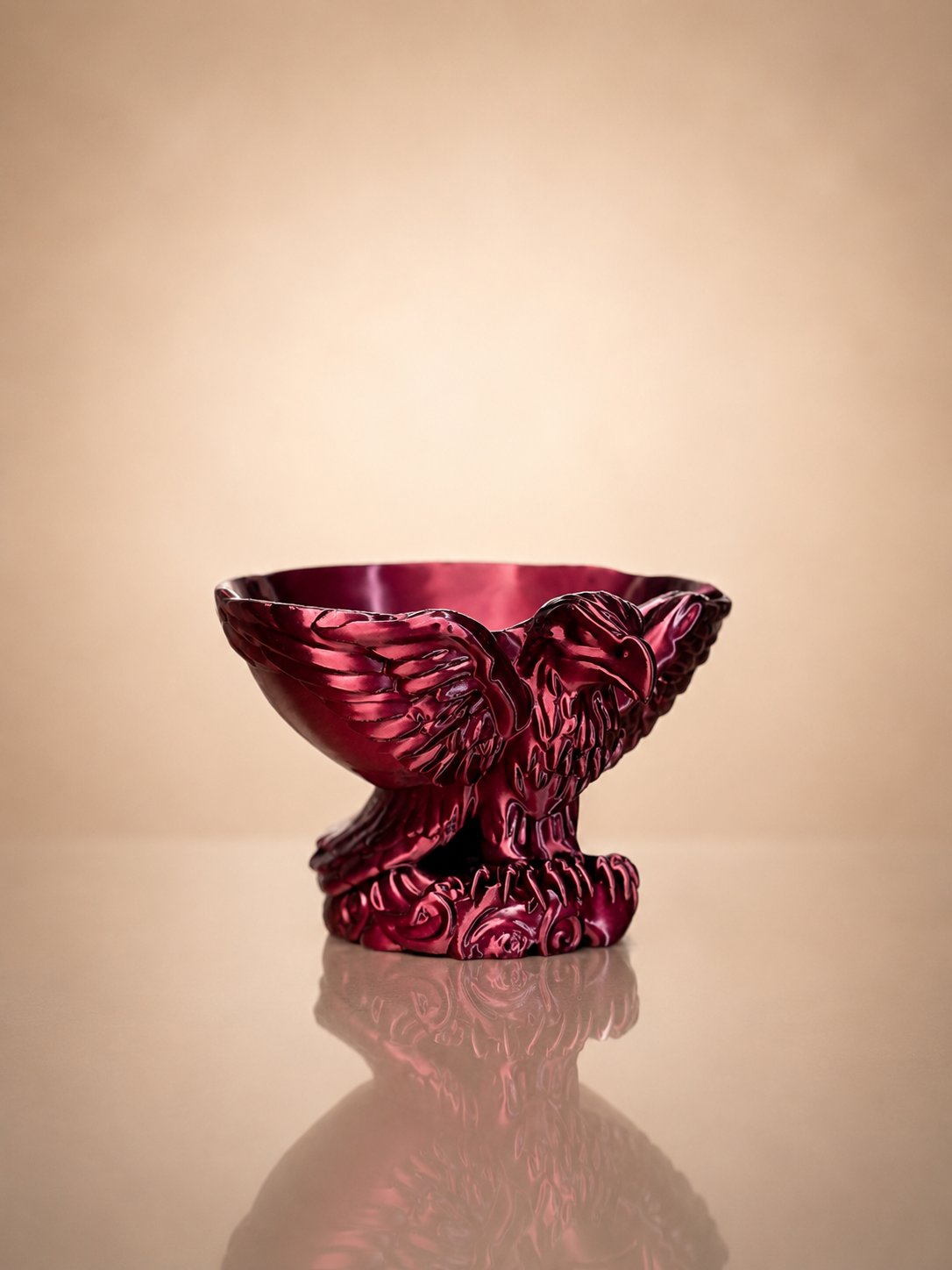 Front view of Eagle Bowl showcasing detailed eagle feathers and sculptural design.