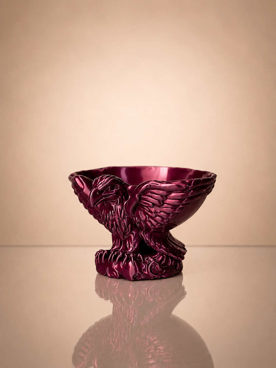 Side view of Eagle Bowl highlighting intricate eagle figure and textured details.