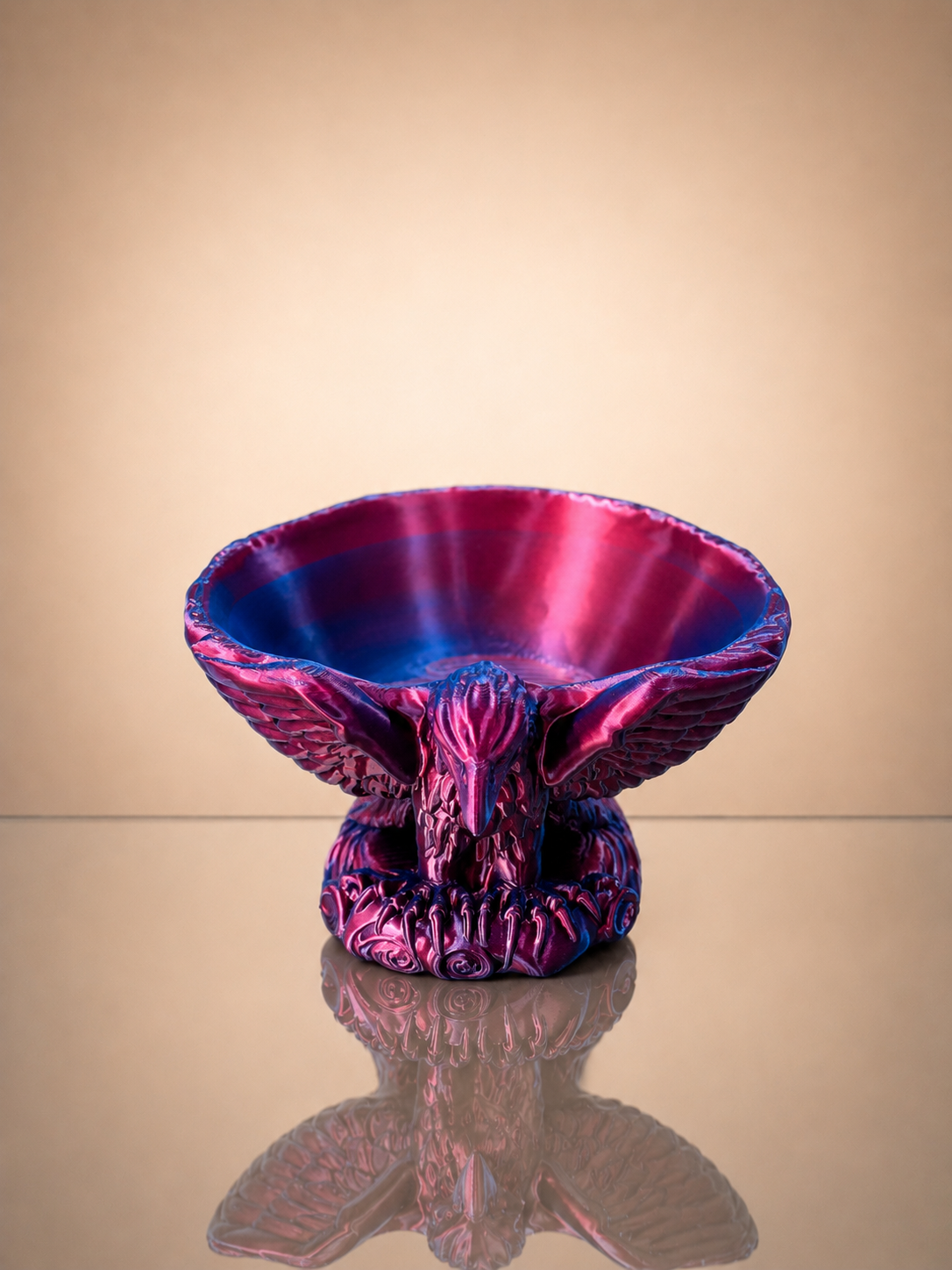 Eagle Bowl with metallic gradient finish used as a statement décor piece.
