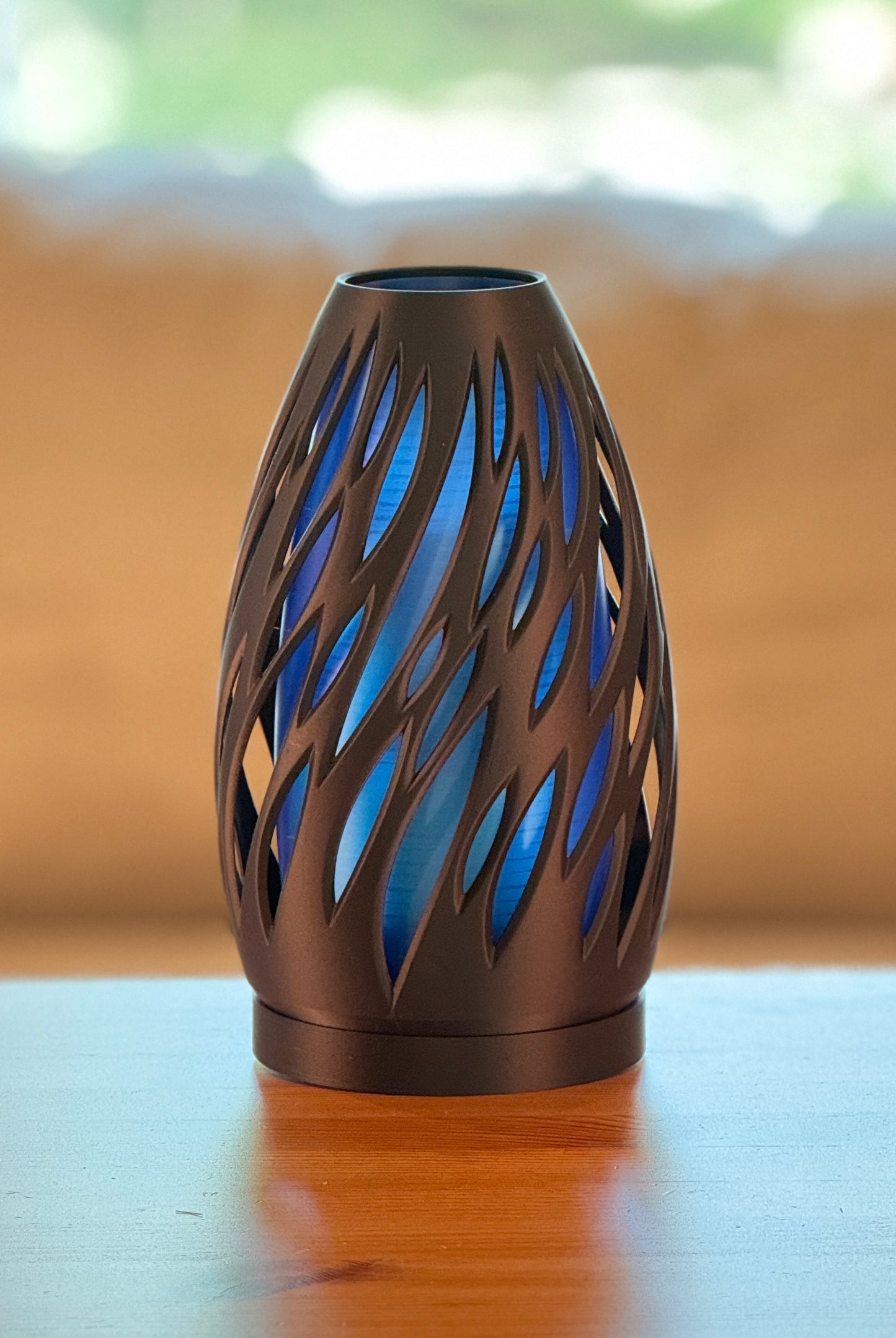 Spectra lamp illuminated on wooden table in a modern interior