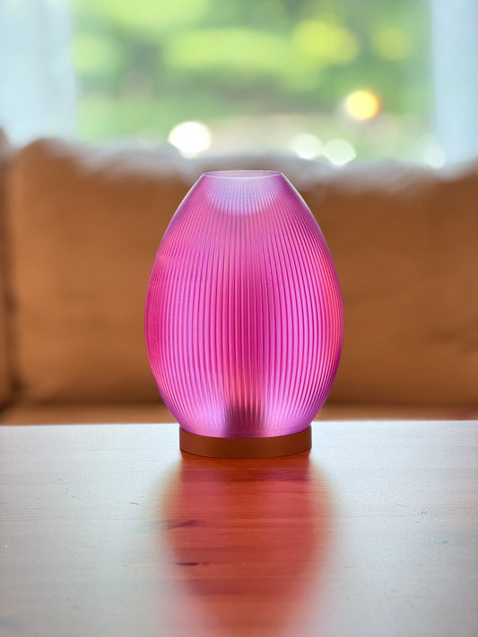 Modern flame-inspired lampshade diffusing soft warm light