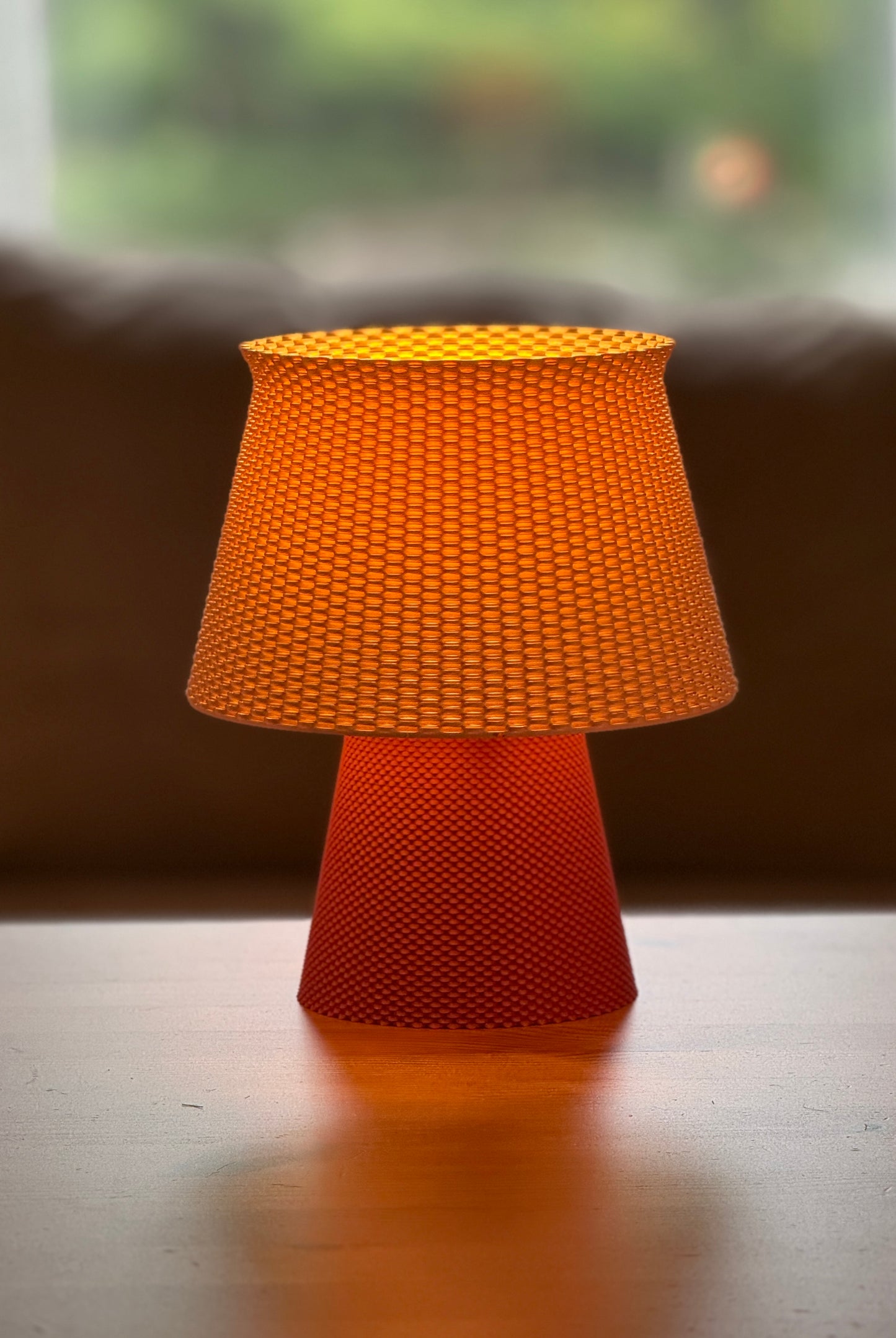 Bruno Table Lamp Ripplemesh showcasing textured design and warm diffused glow.