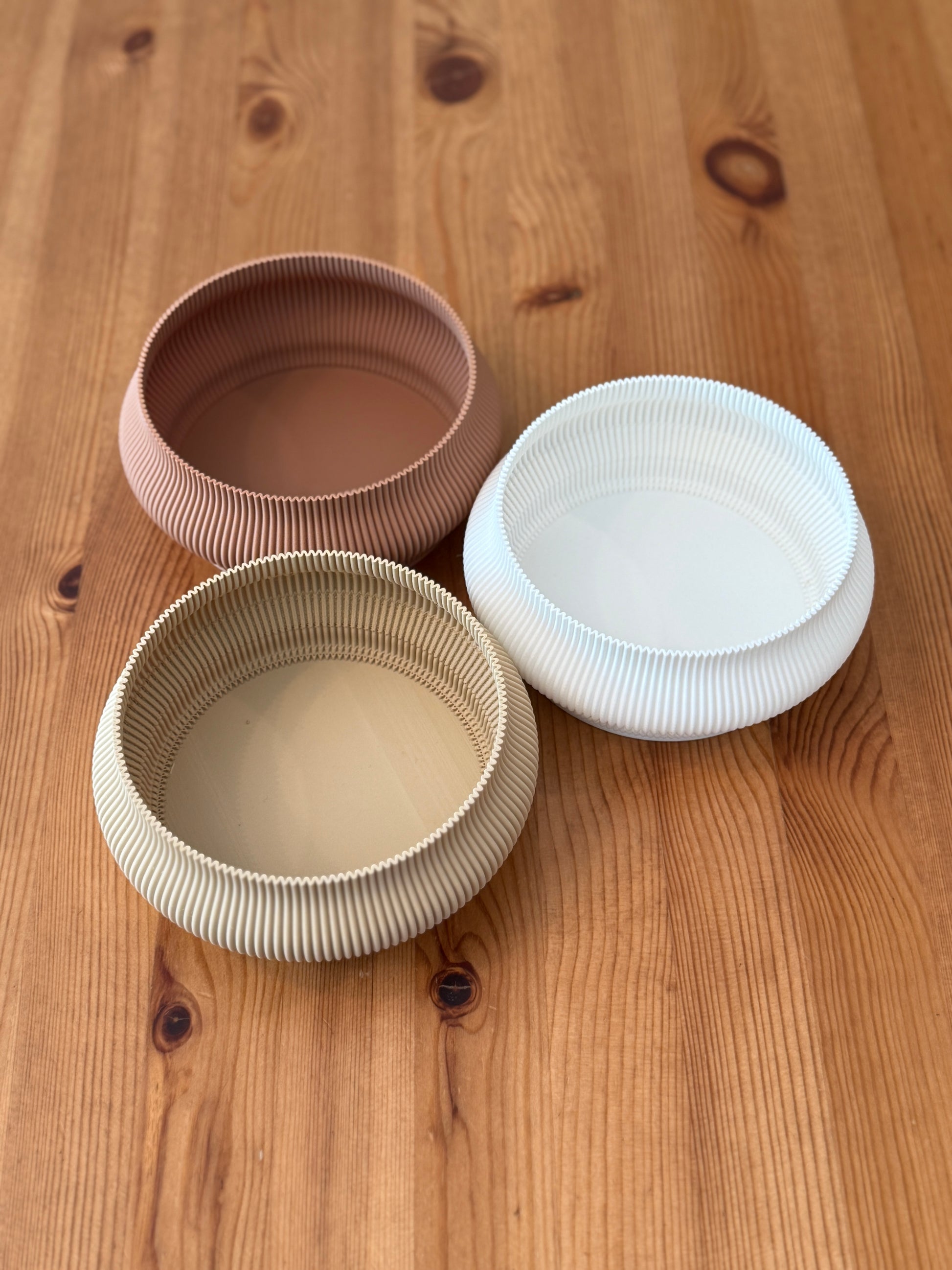 Sculptural Isla Plate featuring organic curves and contemporary style