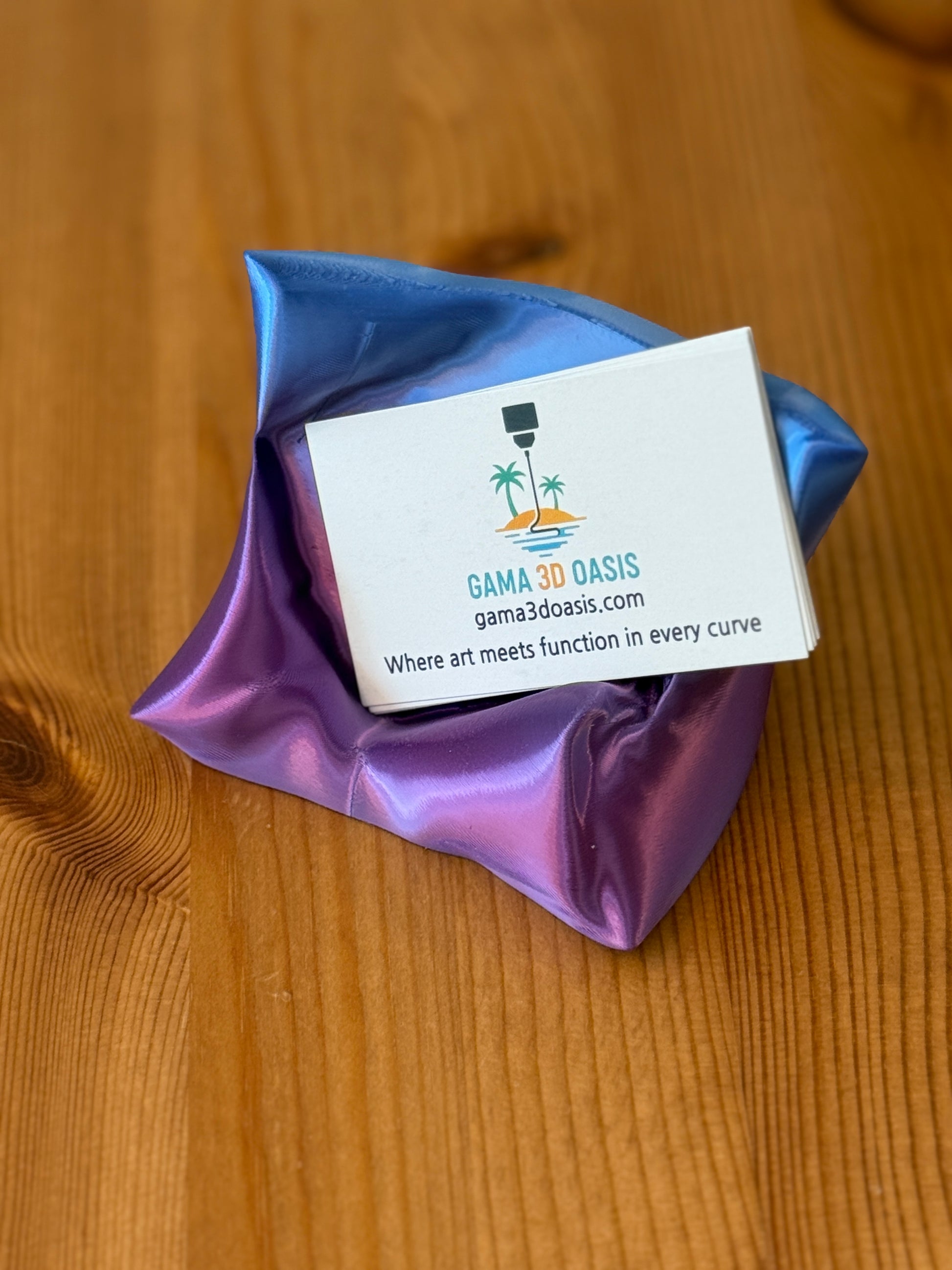 The Card Cradle modern minimalist card holder on desk surface