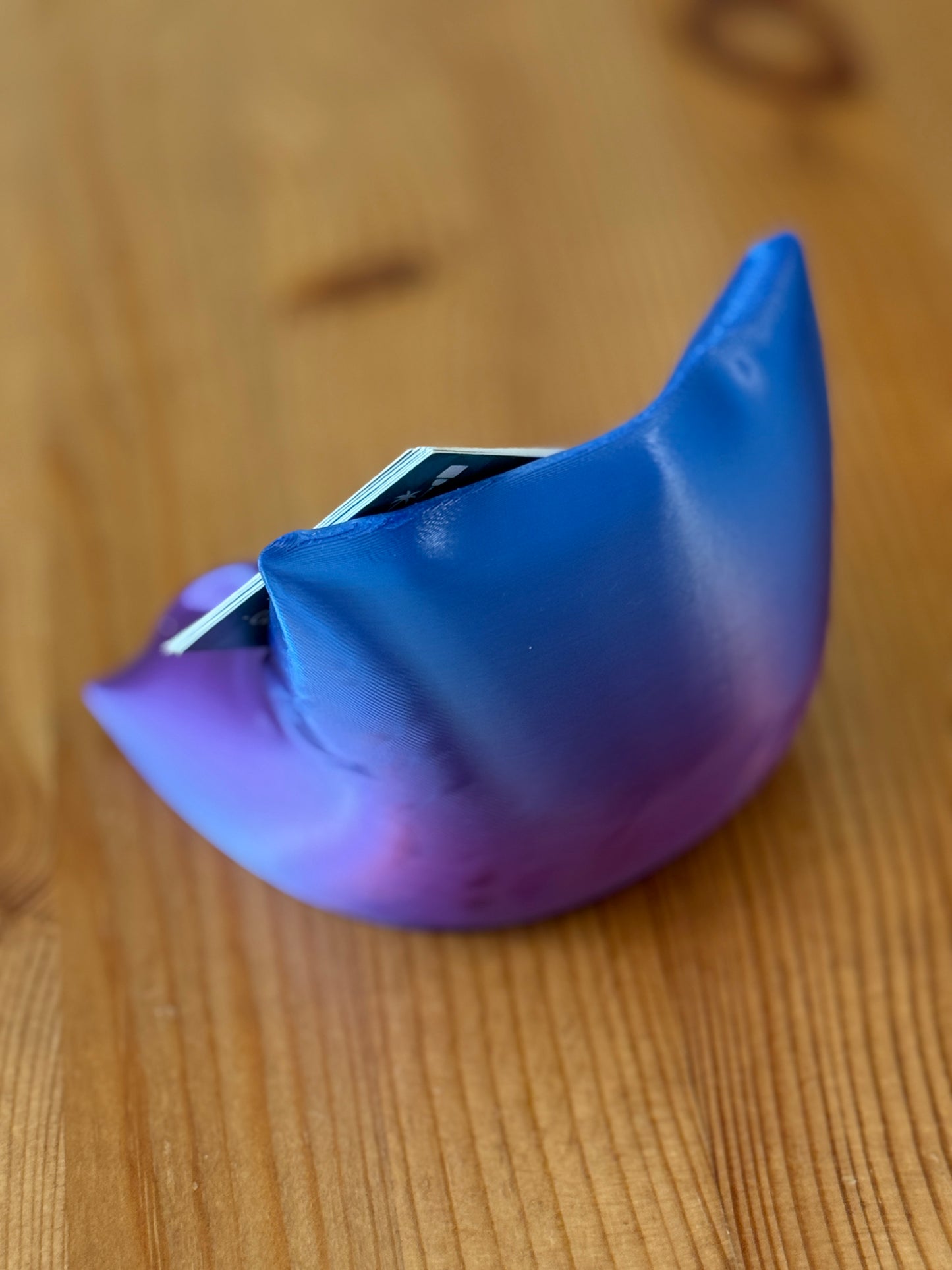 The Card Cradle card holder adding minimalist style to workspace