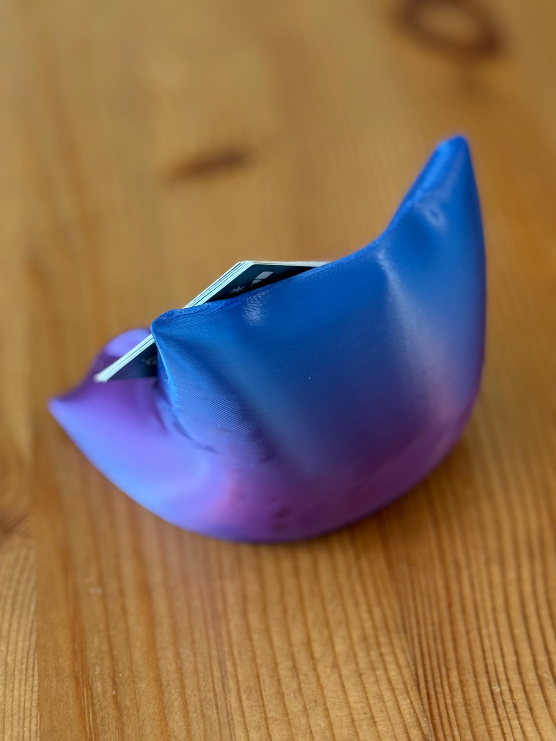 The Card Cradle card holder adding minimalist style to workspace