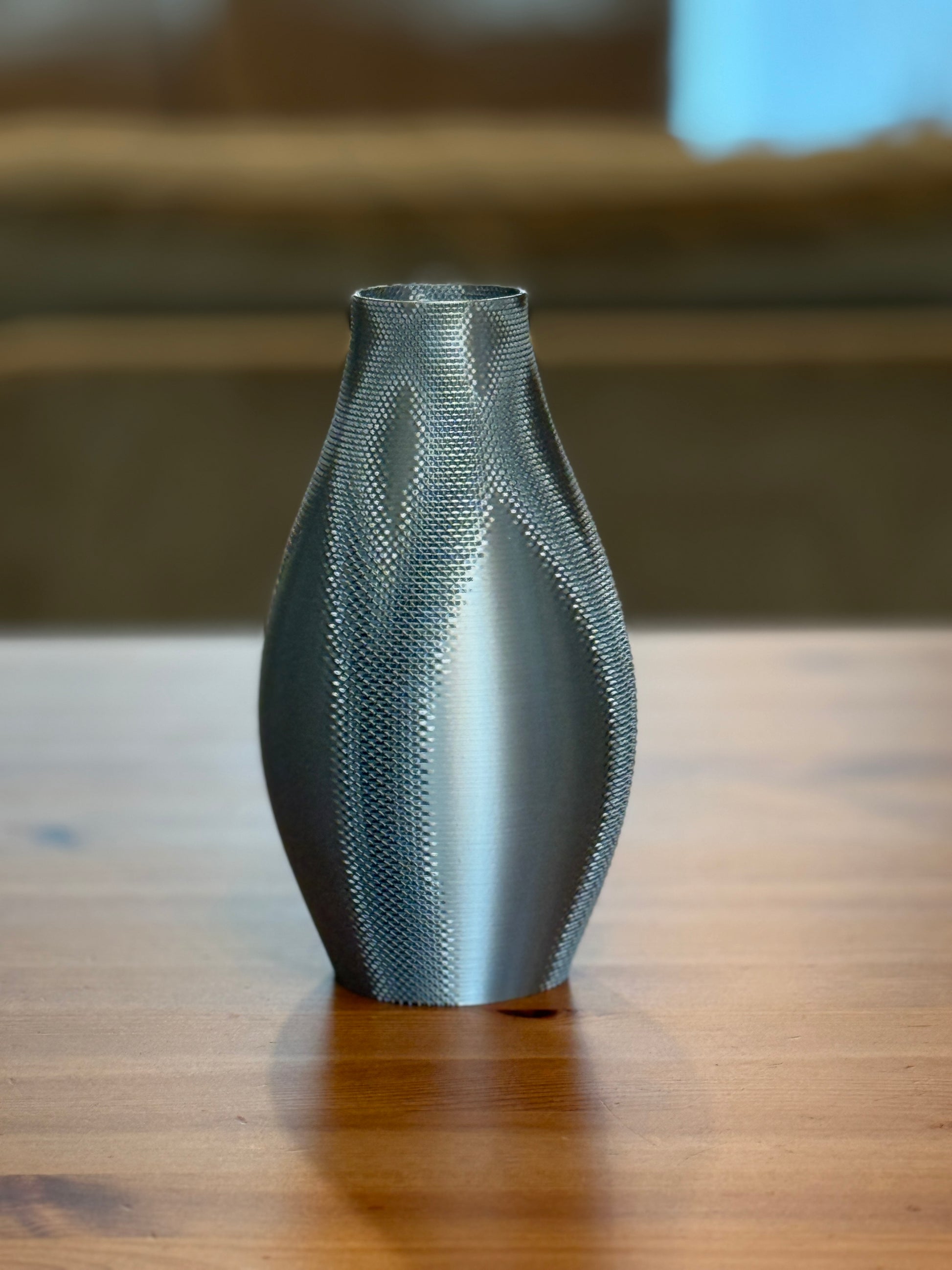 Modern Vanina flower vase displayed with fresh flowers in contemporary setting