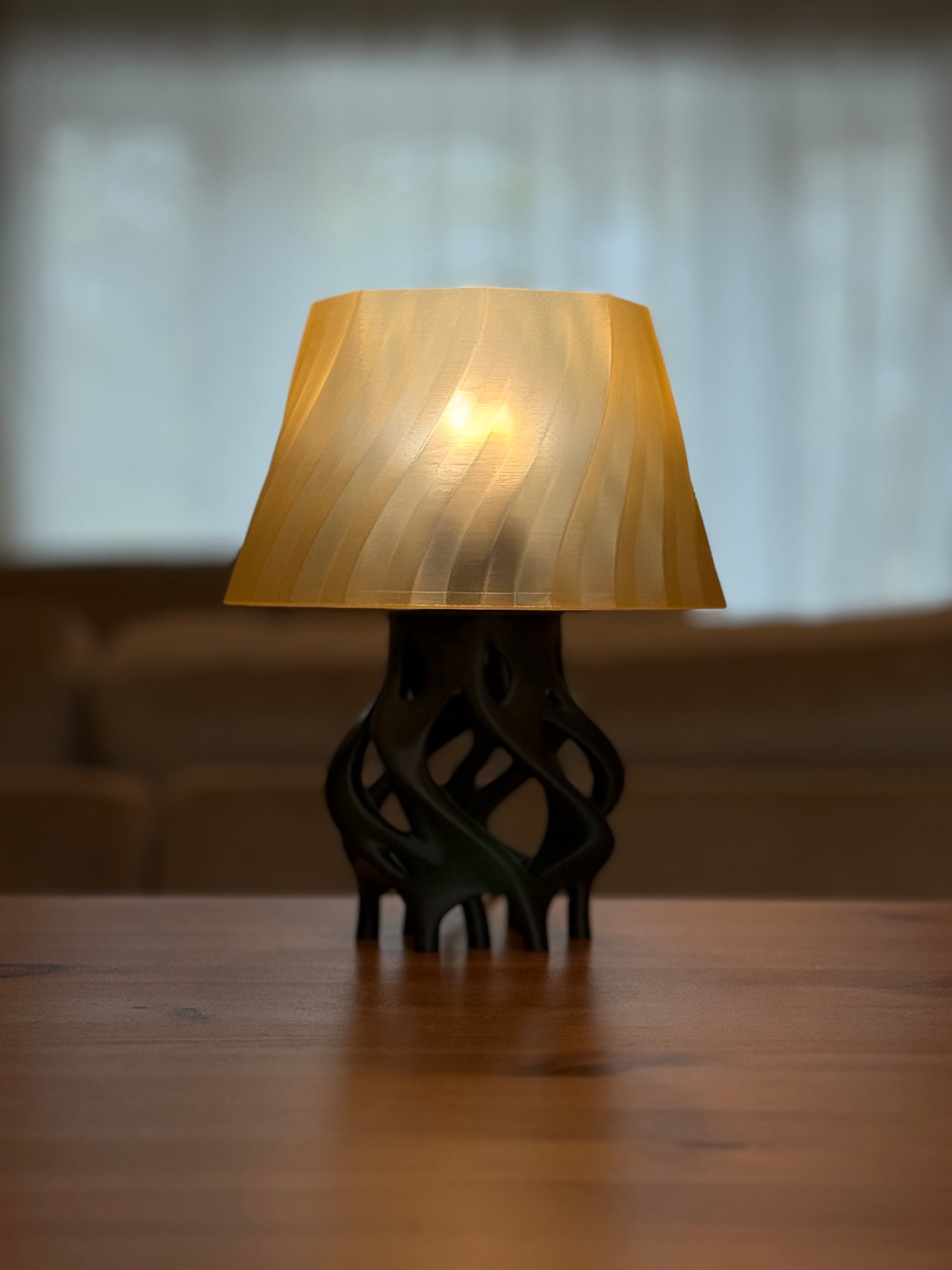 Nature-inspired Root table lamp casting soft light in modern interior