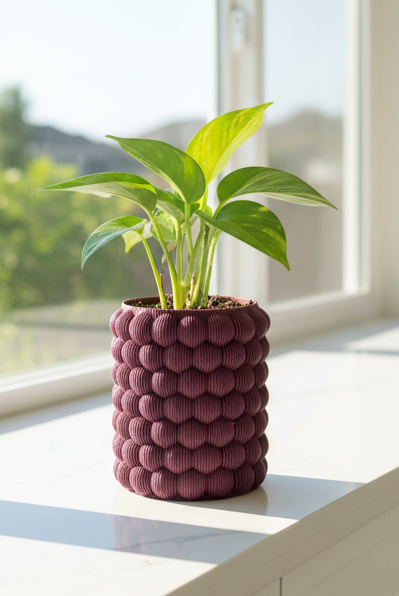 Blob planter with organic sculptural shape for modern plant décor