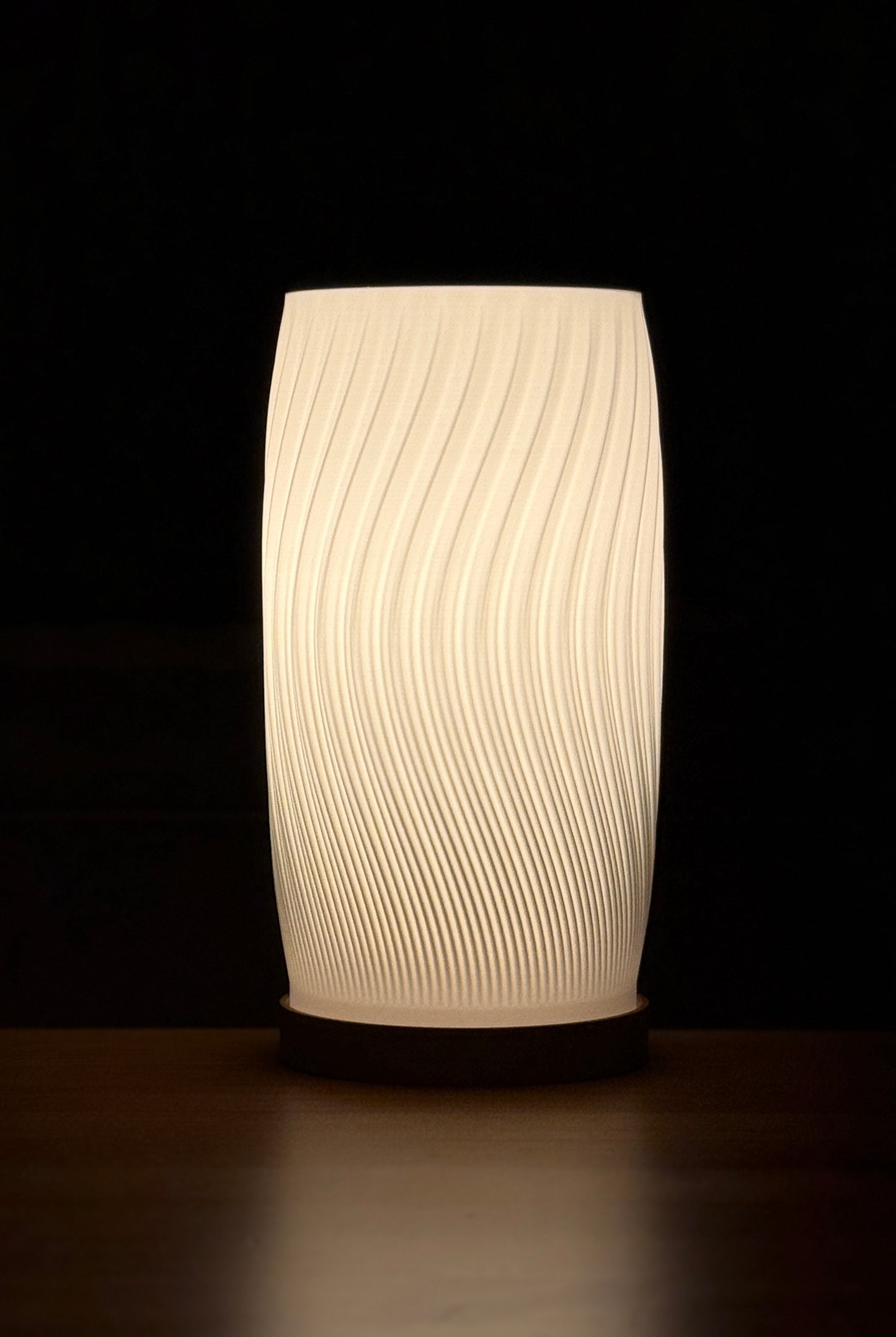 Close-up of Flow Curve Lamp highlighting its curved form and textured surface