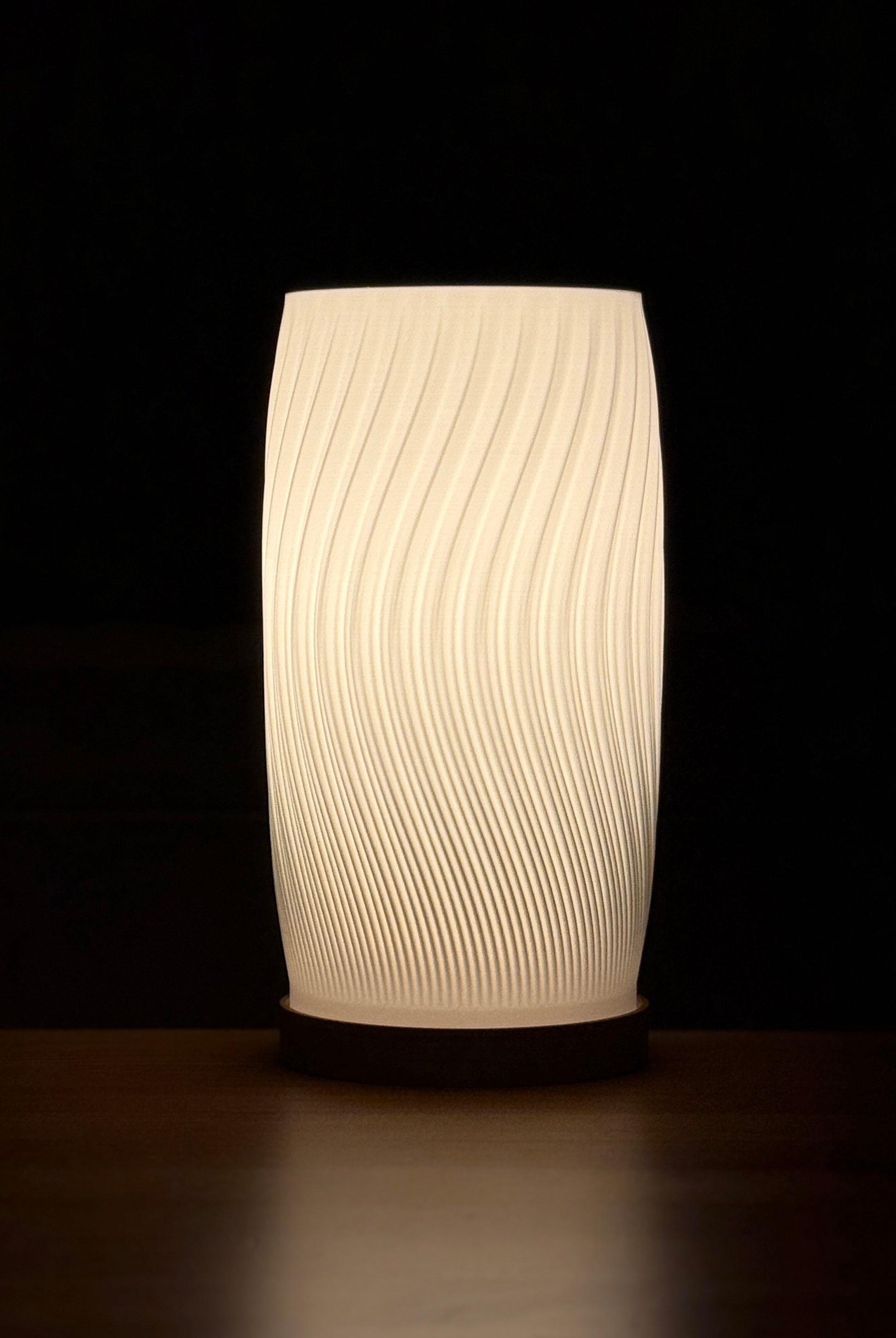 Close-up of Flow Curve Lamp highlighting its curved form and textured surface