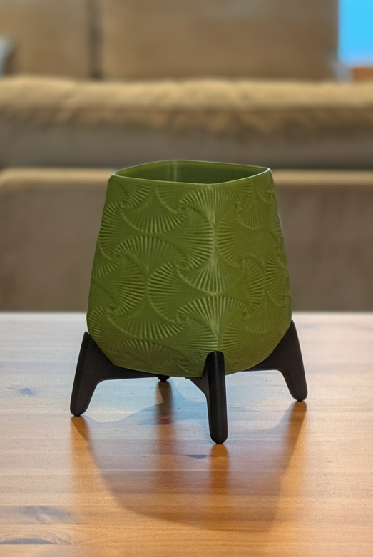 Freya floor planter pot displayed with indoor plant in contemporary interior