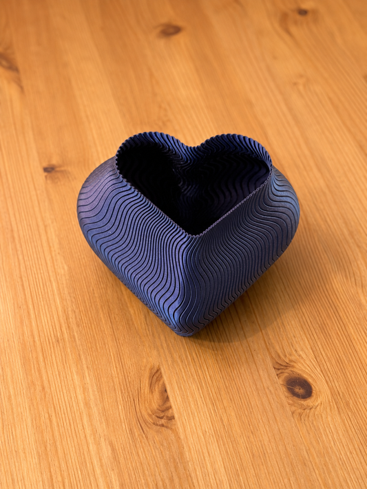 Heart Plant Pot, sculptural planter with wave texture in navy blue.