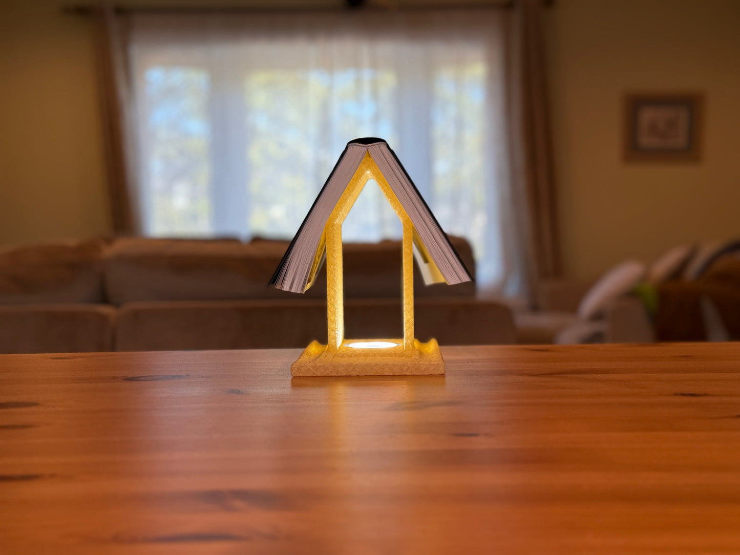 Unique table lamp designed for book lovers with sculptural stacked book form