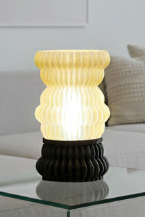 Close-up of Leña Lamp highlighting its textured, organic surface