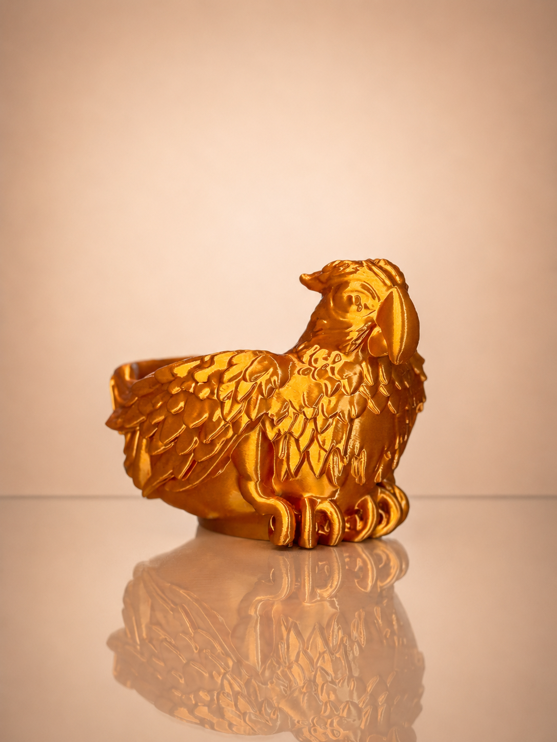 Side view of the Parrot Bowl showcasing the detailed bird sculpture and textured feather design.