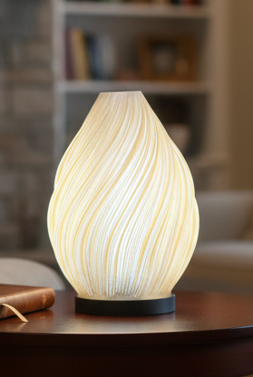 Spiral Flame Lamp glowing with warm flame-like ambient light