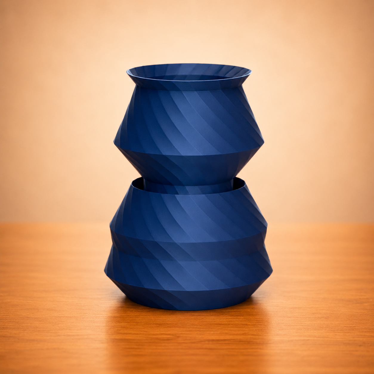 Blue Stacker vase with sculptural stacked form and modern geometric design, decorative accent for shelves and tables.
