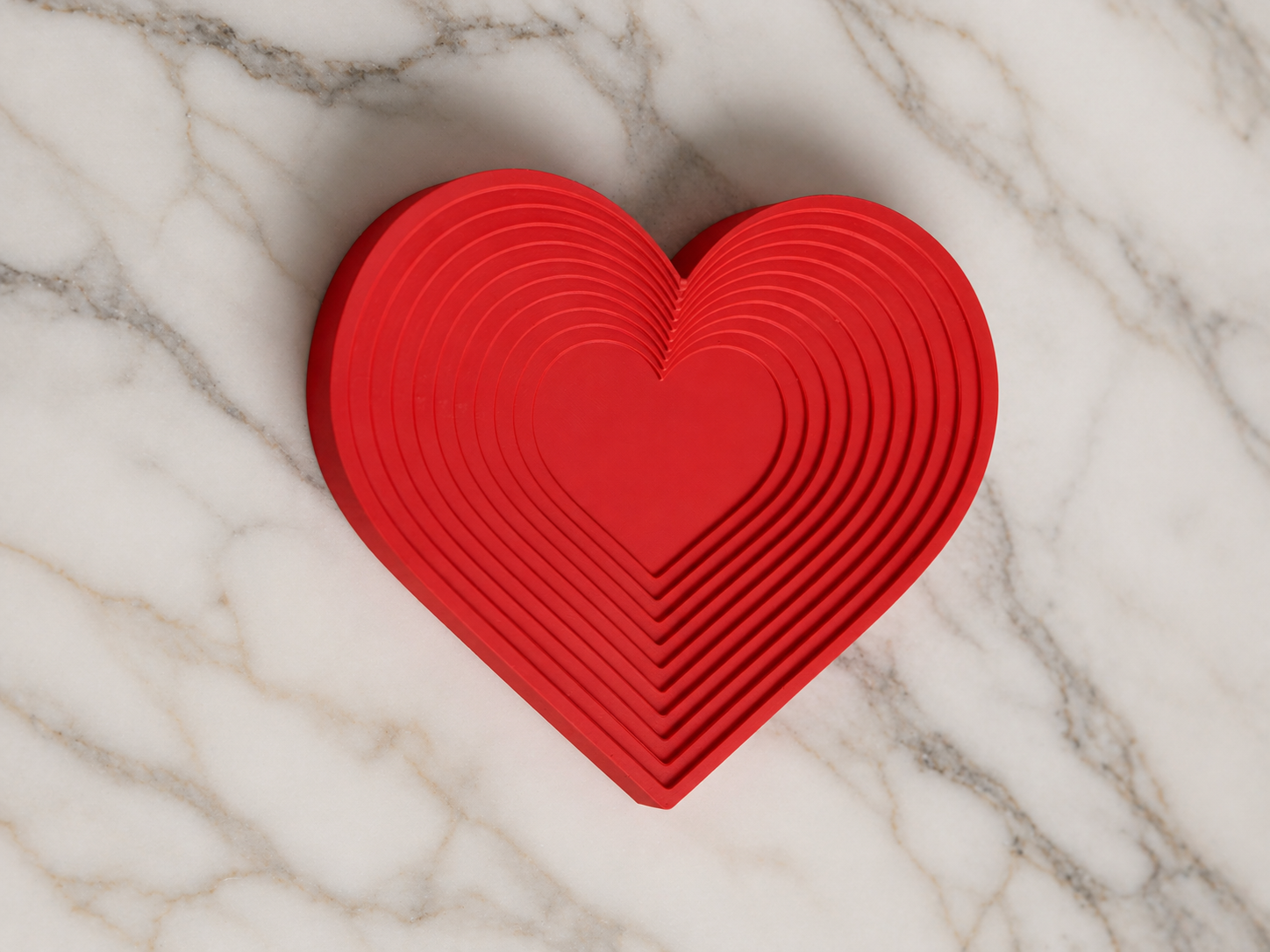 Strix Heart Tray decorative catchall with sculpted heart shape and modern design.