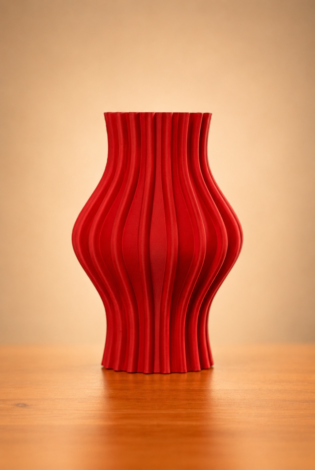 Tronco Vase with flowing ribbed texture and modern sculptural silhouette.